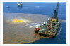 Manned Rig in Oil Spilled Waters by Anonymous