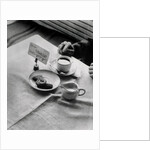 A Placard Being Placed on a Table by Anonymous