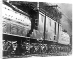Steam Railroad Running Along Tracks by Anonymous