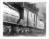 Steam Railroad Running Along Tracks by Anonymous