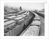 Train Cars Holding Coal Supplies by Anonymous