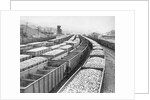 Train Cars Holding Coal Supplies by Anonymous