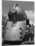 Inventor Standing by His Train Model by Anonymous