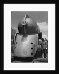 Inventor Standing by His Train Model by Anonymous