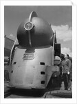 Inventor Standing by His Train Model by Anonymous