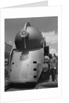 Inventor Standing by His Train Model by Anonymous