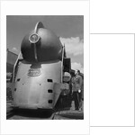 Inventor Standing by His Train Model by Anonymous