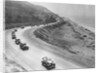 Automobiles Driving Along a Highway by Anonymous