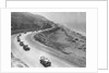 Automobiles Driving Along a Highway by Anonymous