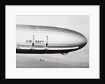 Plane Underneath Huge Dirigible in Flight by Anonymous