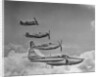Four Military Planes in Flight by Anonymous