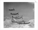 Four Military Planes in Flight by Anonymous