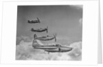 Four Military Planes in Flight by Anonymous