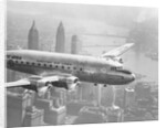 Aircraft Flying over City by Anonymous