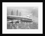 Aircraft Flying over City by Anonymous