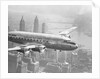 Aircraft Flying over City by Anonymous