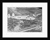 Howard Hughes Lockheed 14 Super Electra over Worlds Fair Site by Anonymous