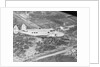 Howard Hughes Lockheed 14 Super Electra over Worlds Fair Site by Anonymous