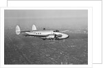 Howard Hughes' Lockheed 14 Super Electra over New York City by Anonymous