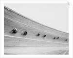 Motorcycles Racing on Sloped Track by Anonymous