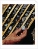 Container of Mineral Deposits Being Examined by Anonymous