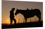 Cowboy Standing with His Horse by Anonymous