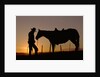 Cowboy Standing with His Horse by Anonymous