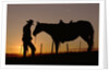 Cowboy Standing with His Horse by Anonymous
