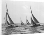 Six Meter Sailboats Leaning in Race by Anonymous
