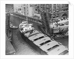 Cargo Ship in Canal by Anonymous