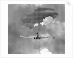 Navy Jet Photographing Hurricane Phenomena by Anonymous