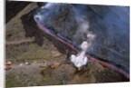 Firefighters Divert Lava Flow by Anonymous