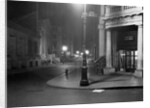 View of Wall Street During Nighttime Hours by Anonymous