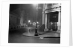 View of Wall Street During Nighttime Hours by Anonymous