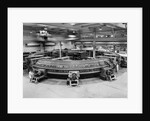 Technicians Near Circular Electronic Device by Anonymous