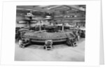 Technicians Near Circular Electronic Device by Anonymous