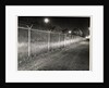 Metal Fence with Barbed Wire by Anonymous