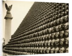 German Helmets Decorating Wall by Anonymous