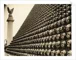 German Helmets Decorating Wall by Anonymous