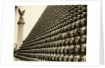 German Helmets Decorating Wall by Anonymous