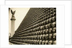 German Helmets Decorating Wall by Anonymous