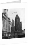 Planes Fly Over Buildings in Chicago by Anonymous