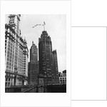 Planes Fly Over Buildings in Chicago by Anonymous