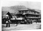 Railroad Passing Through Small Town by Anonymous