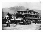 Railroad Passing Through Small Town by Anonymous