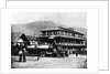 Railroad Passing Through Small Town by Anonymous