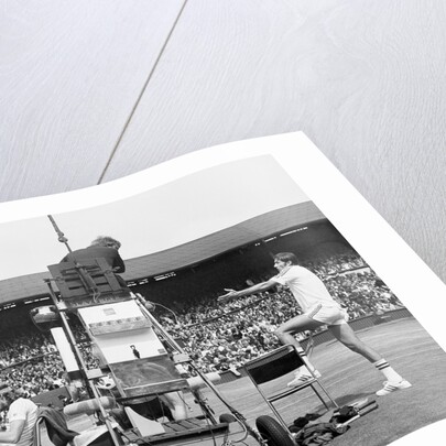 Ilie Nastase argues with the umpire by Associated Newspapers