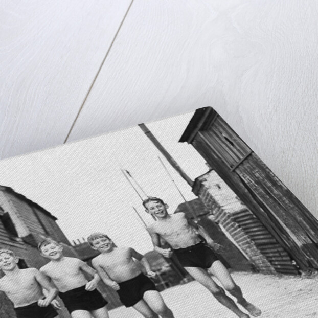 Children off for a swim by Associated Newspapers