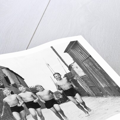 Children off for a swim by Associated Newspapers