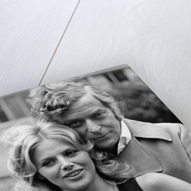 Michael Caine with Britt Ekland by Associated Newspapers